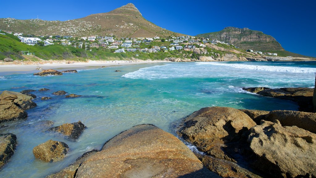 Llandudno Beach featuring rocky coastline and a sandy beach