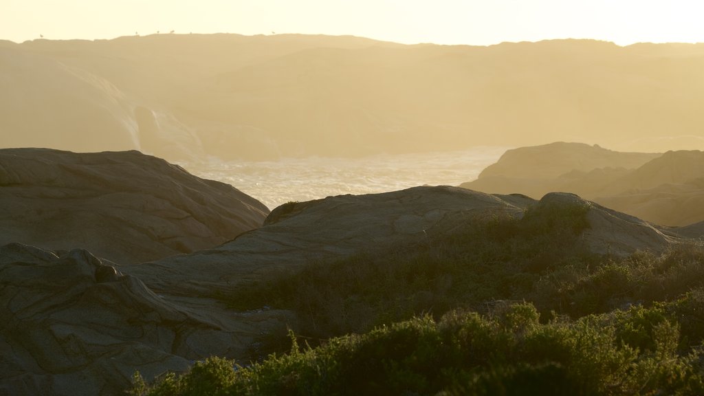 Cape Columbine Lighthouse showing general coastal views, landscape views and a sunset