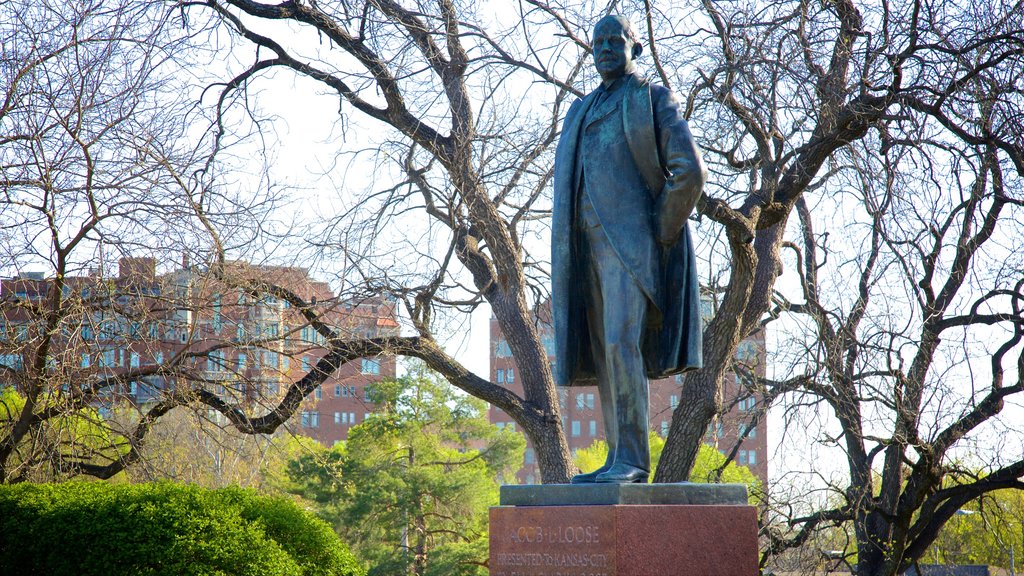 Loose Park showing a statue or sculpture and a garden