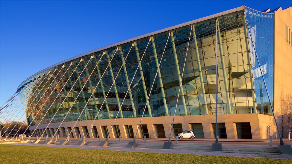 Kauffman Center for the Performing Arts showing a sunset and modern architecture