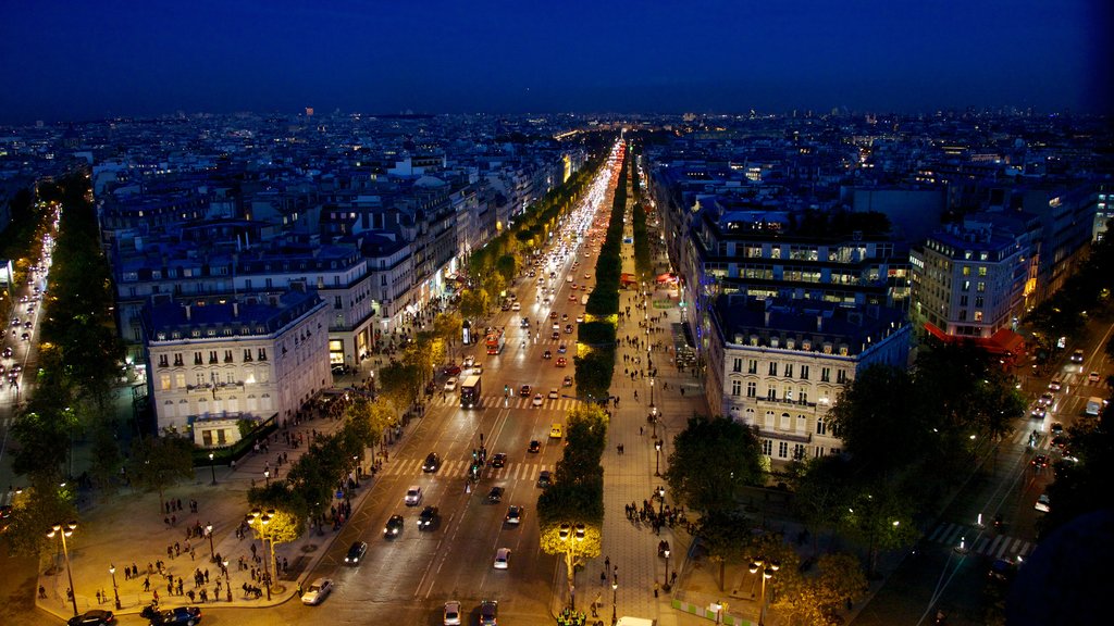 Champs Elysees joka esittää katunäkymät, yökuvat ja kaupunki