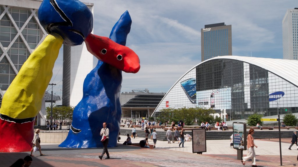 La Defense showing city views, art and a high-rise building