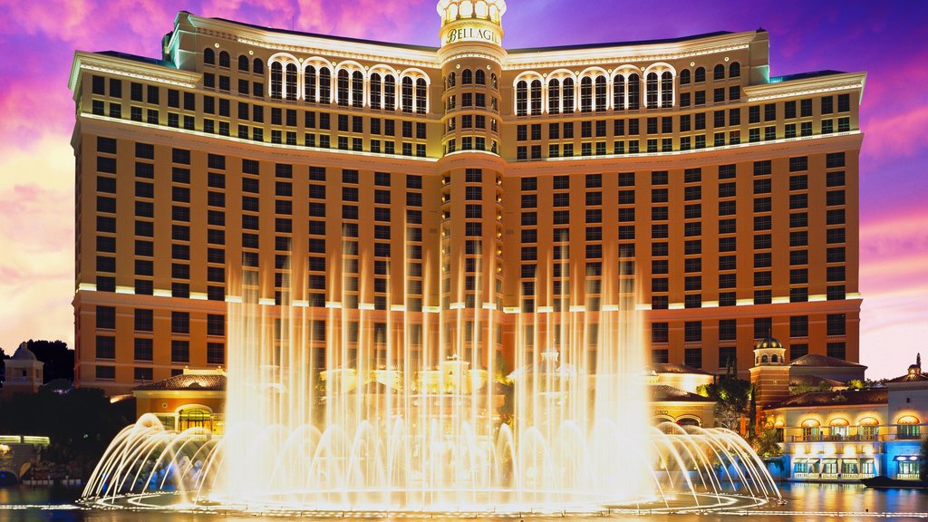 Bellagio Casino which includes a fountain, a pond and a city