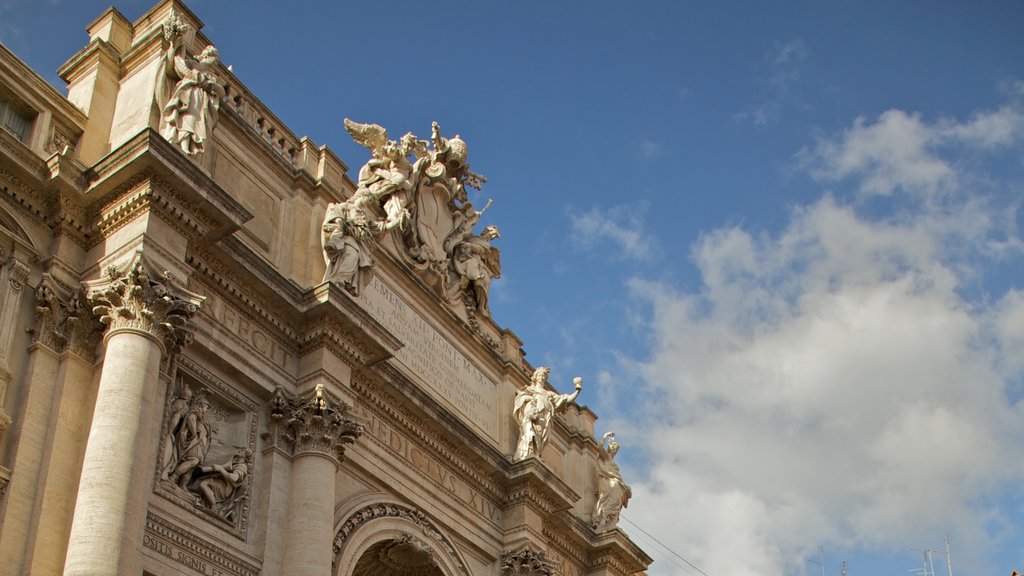 Trevi Fountain showing heritage architecture, skyline and a monument