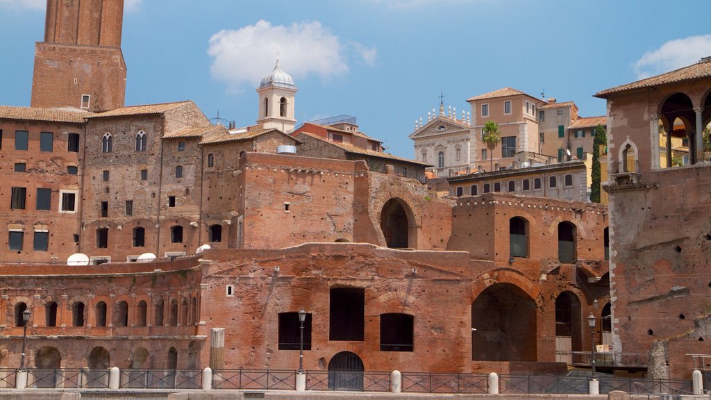 Piazza Venezia showing a castle, heritage architecture and a monument