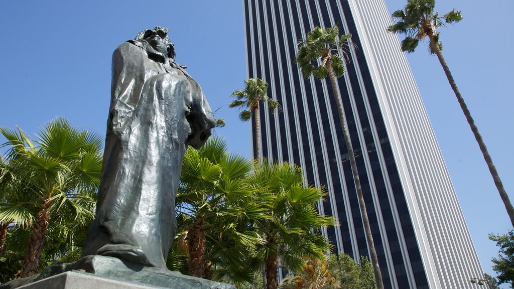 Los Angeles County Museum of Art featuring a statue or sculpture, art and a skyscraper