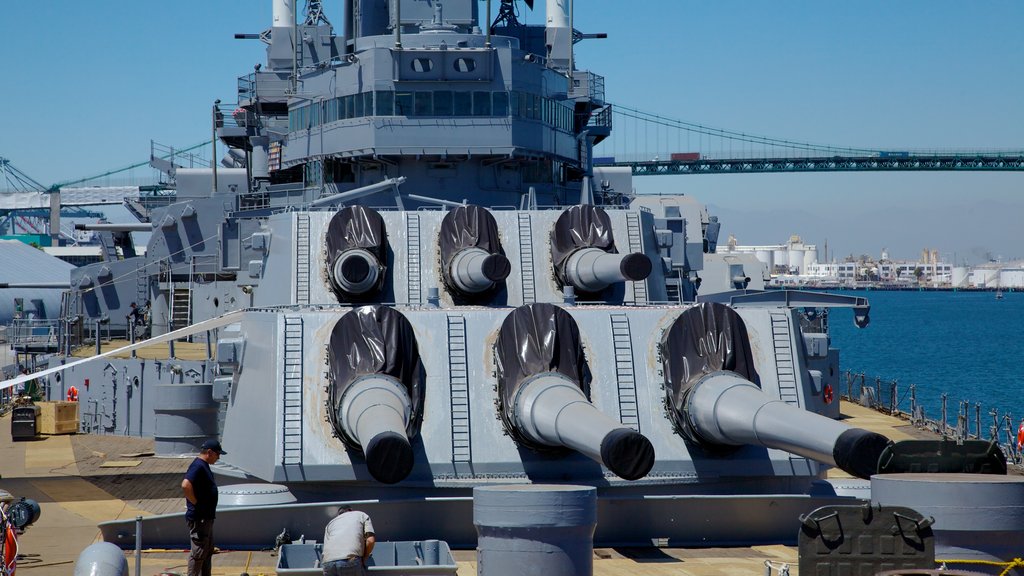 USS Iowa showing a bay or harbour, military items and skyline