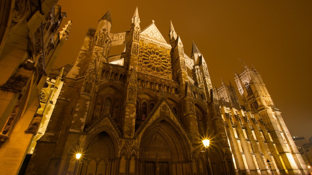 Westminster Abbey which includes religious elements, night scenes and a church or cathedral