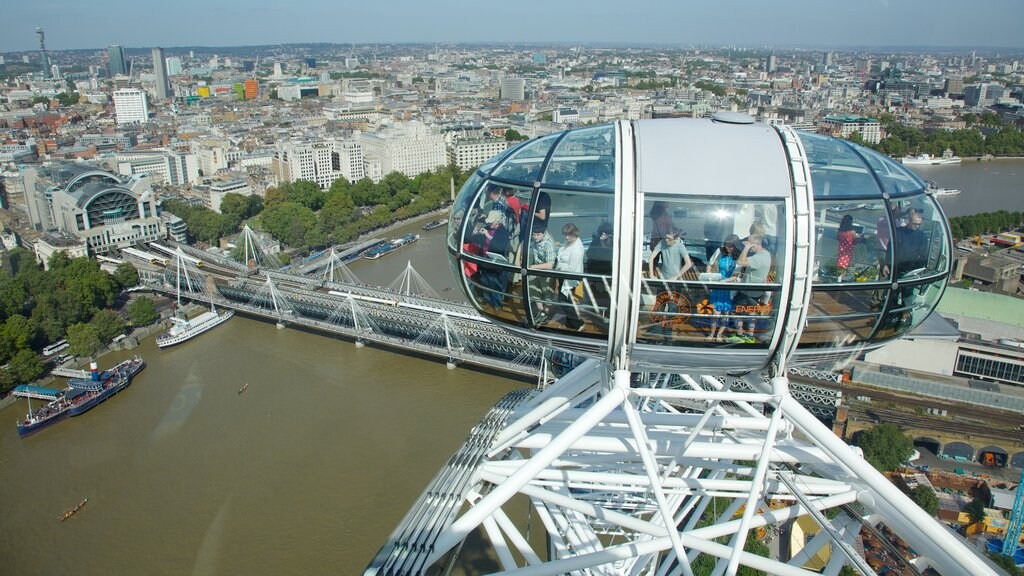 London Eye showing modern architecture, a river or creek and views