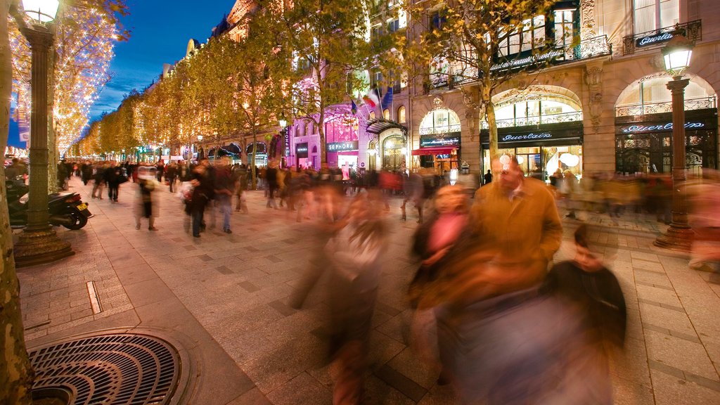 Champs Elysees featuring street scenes, nightlife and a city