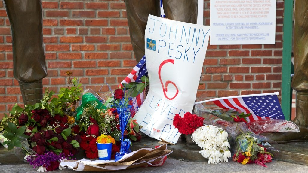 Fenway Park showing signage and flowers