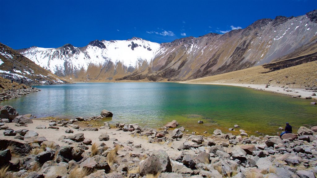 Nevado de Toluca National Park featuring a lake or waterhole, snow and mountains