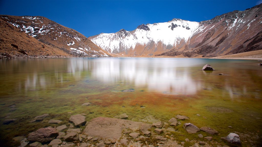 Nevado de Toluca National Park which includes a lake or waterhole, mountains and snow