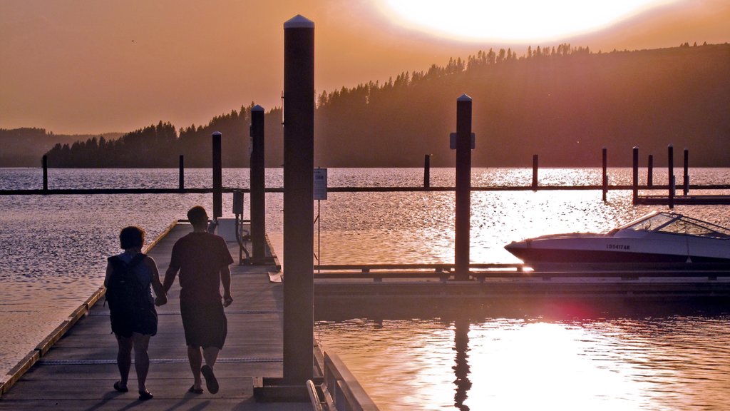 Harrison showing a sunset as well as a couple