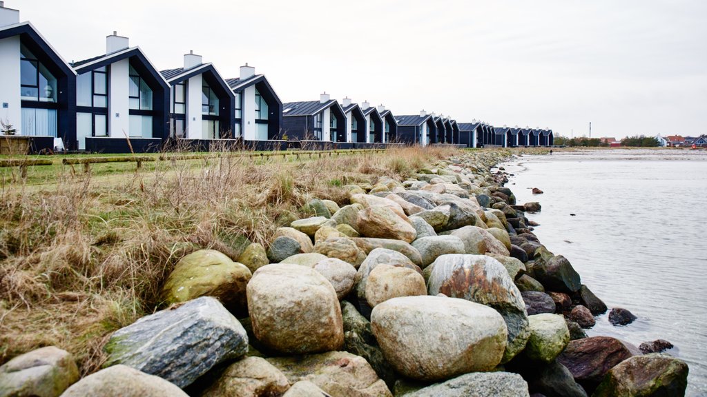 Oster Hurup which includes rocky coastline