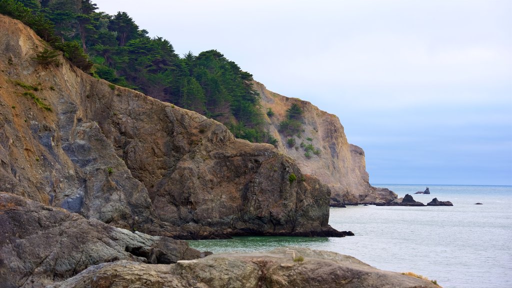 China Beach showing rocky coastline and general coastal views