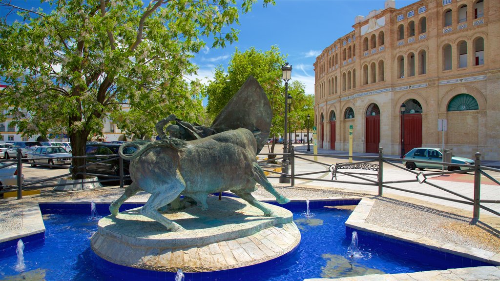 El Puerto de Santa Maria featuring a fountain and a statue or sculpture