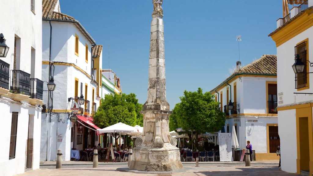 Plaza del Potro que incluye una plaza y un monumento