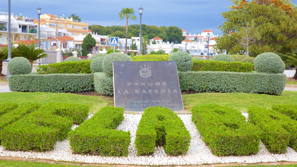 La Bateria Park showing a garden and signage