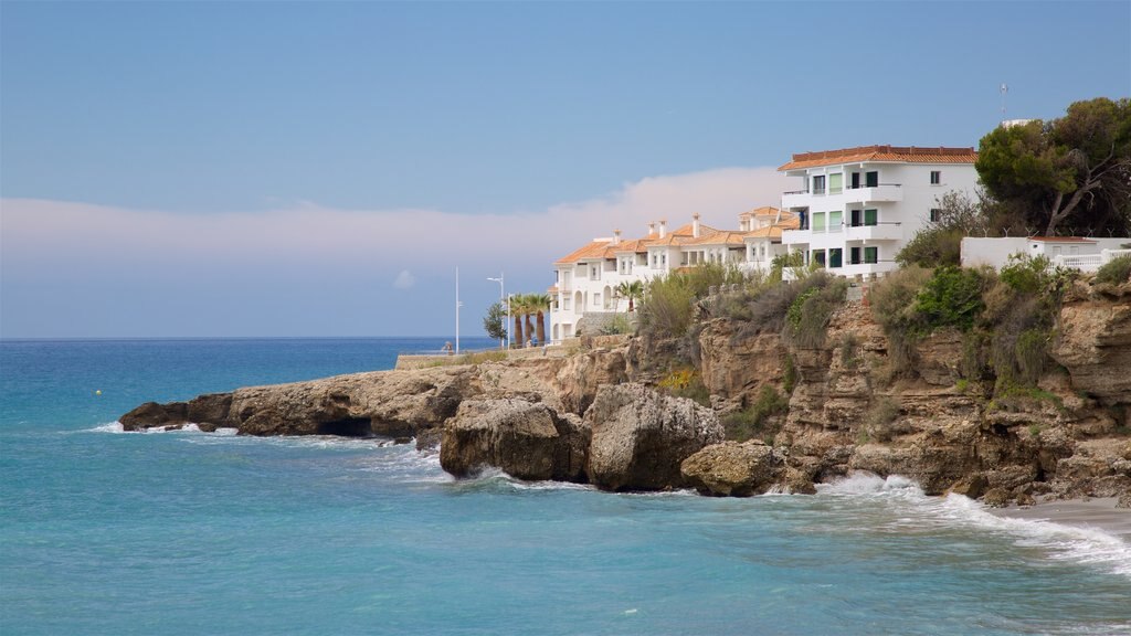 Salon Beach featuring rocky coastline and a coastal town