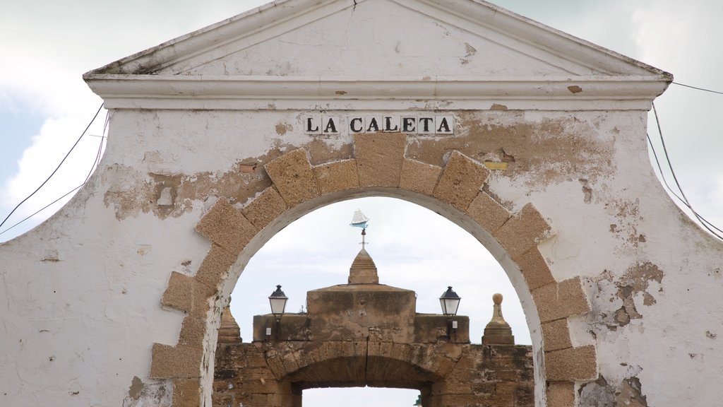 Fortress of San Sebastian which includes signage, château or palace and heritage elements