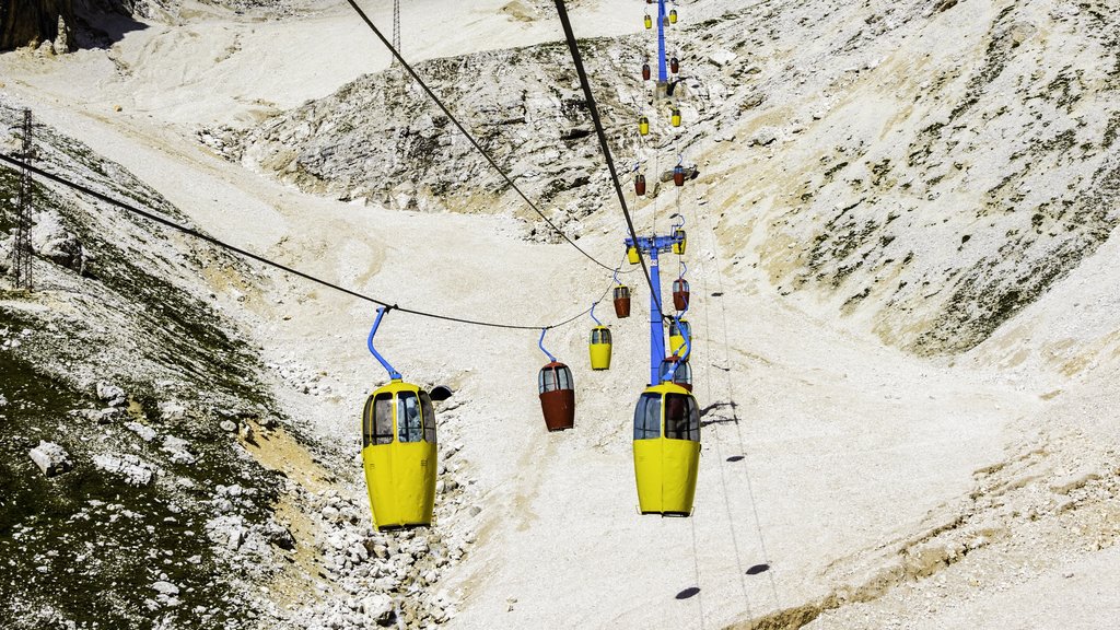 Eastern Dolomites showing a gondola and mountains