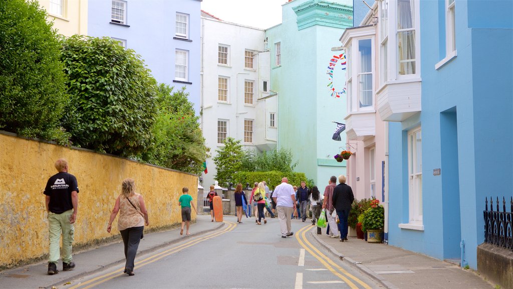 Tenby featuring street scenes and a coastal town as well as a small group of people