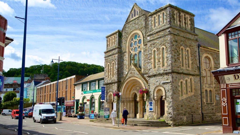 Mumbles featuring street scenes, a church or cathedral and heritage elements