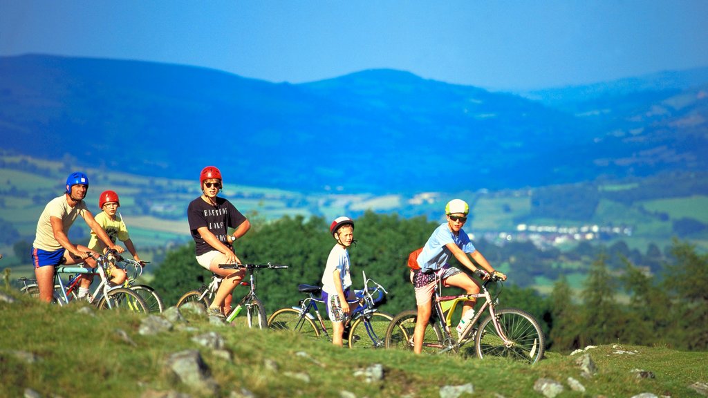 Powys showing tranquil scenes and mountain biking as well as a family