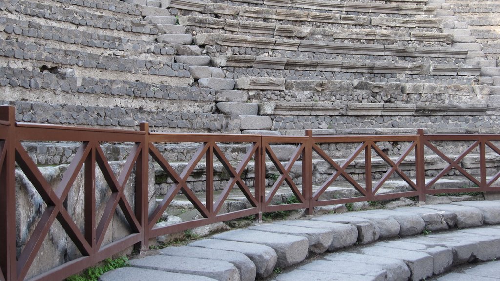 Mount Vesuvius - Pompei showing theater scenes, building ruins and heritage elements