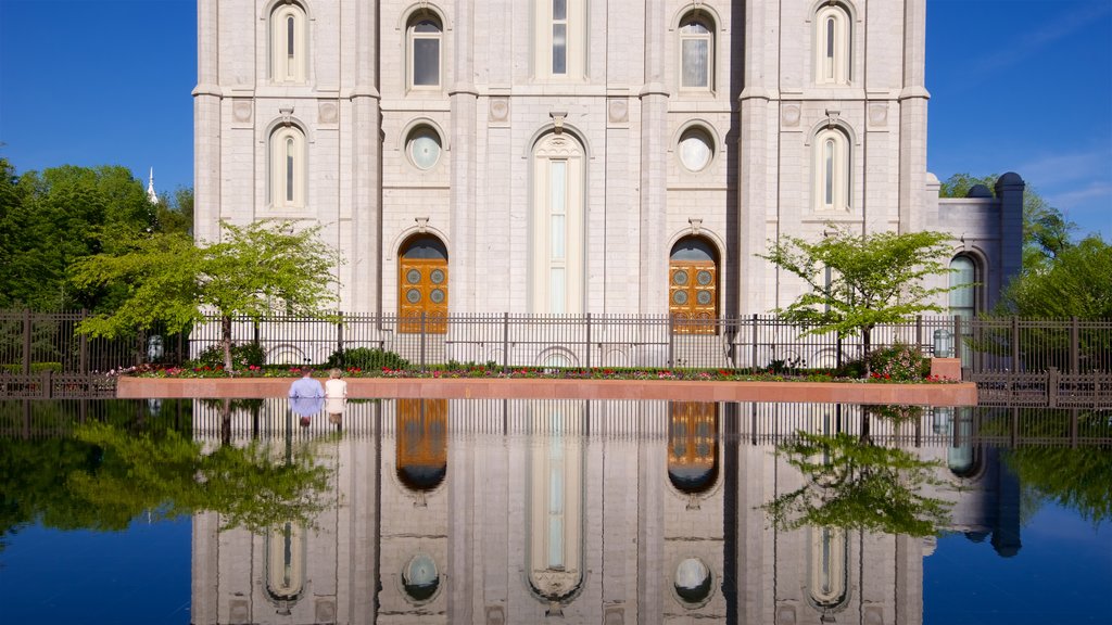 Salt Lake Temple showing heritage architecture and a lake or waterhole