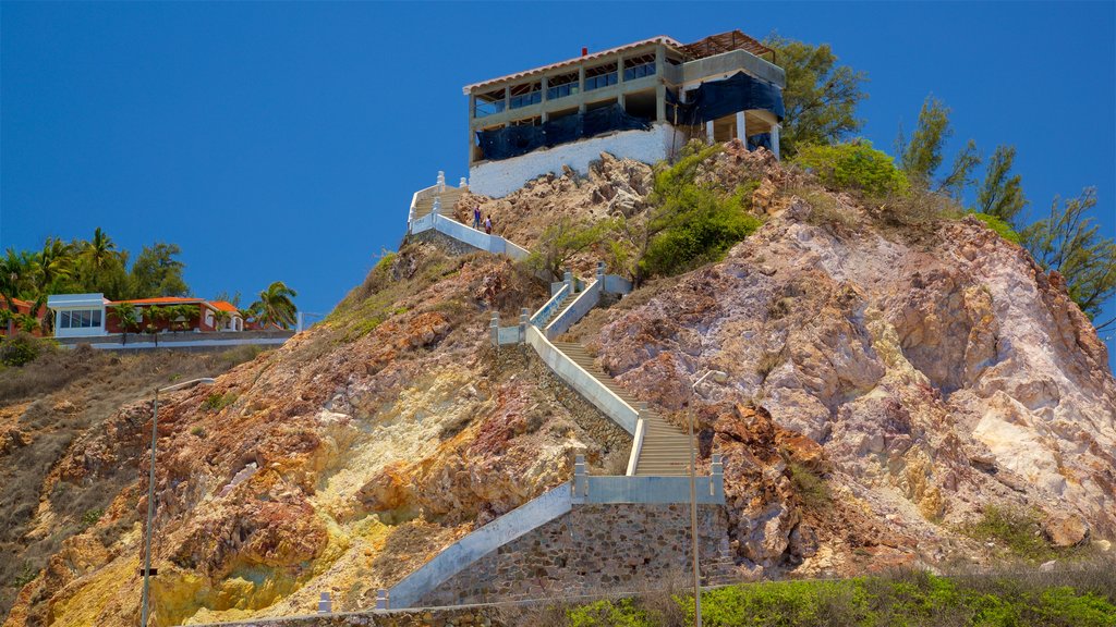 El Mirador showing building ruins and a house