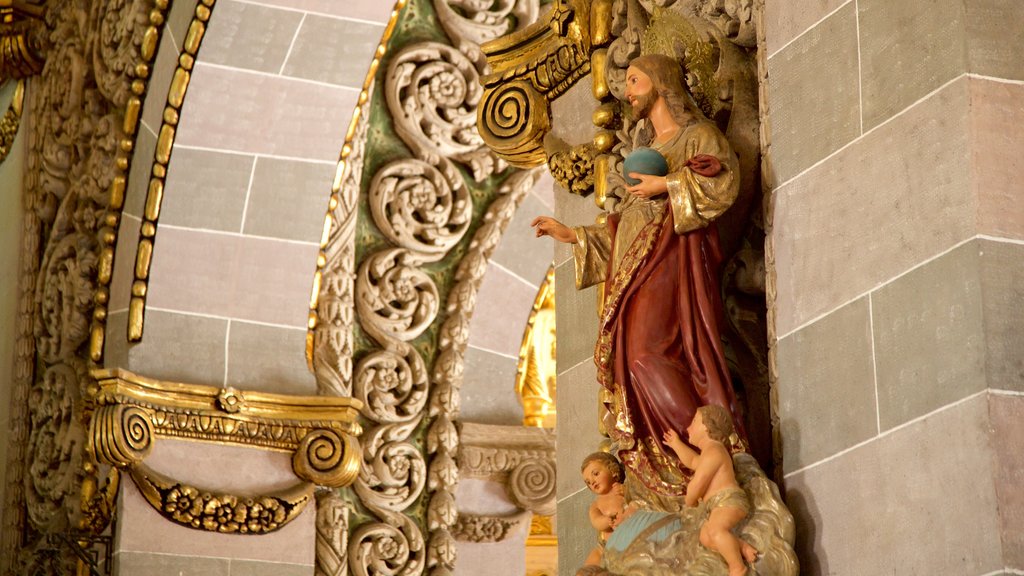 Immaculate Conception Cathedral featuring a statue or sculpture, religious aspects and interior views