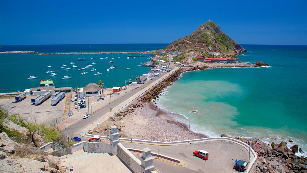 El Faro Lighthouse featuring general coastal views, mountains and rocky coastline