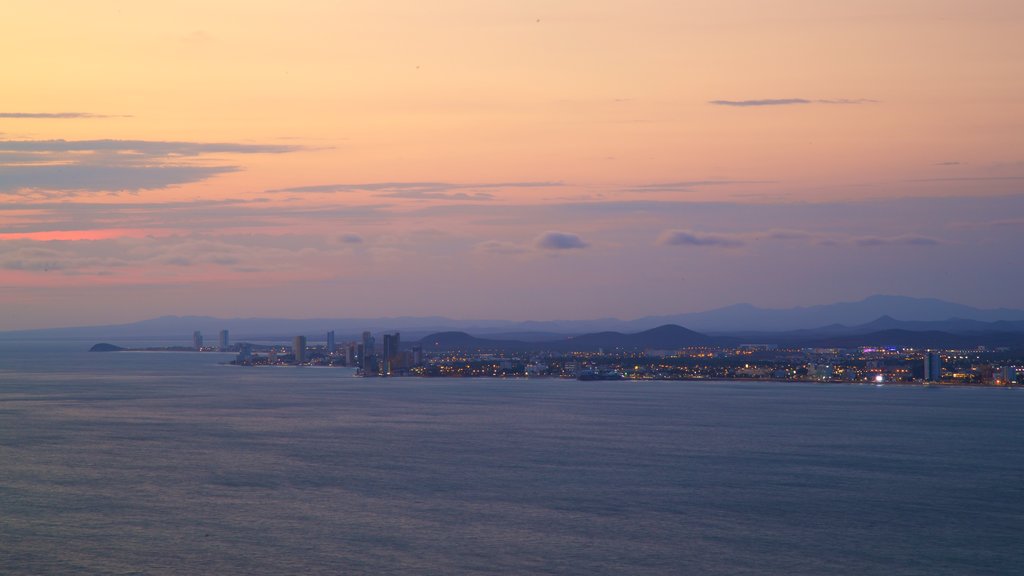 El Faro Lighthouse featuring general coastal views and a sunset