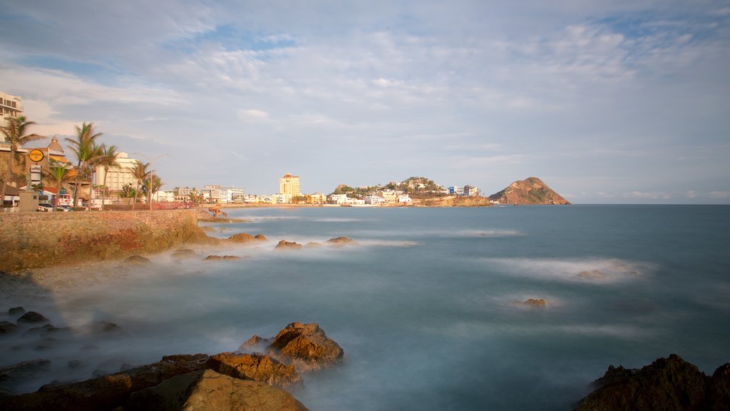 Divers Point which includes a sunset and general coastal views