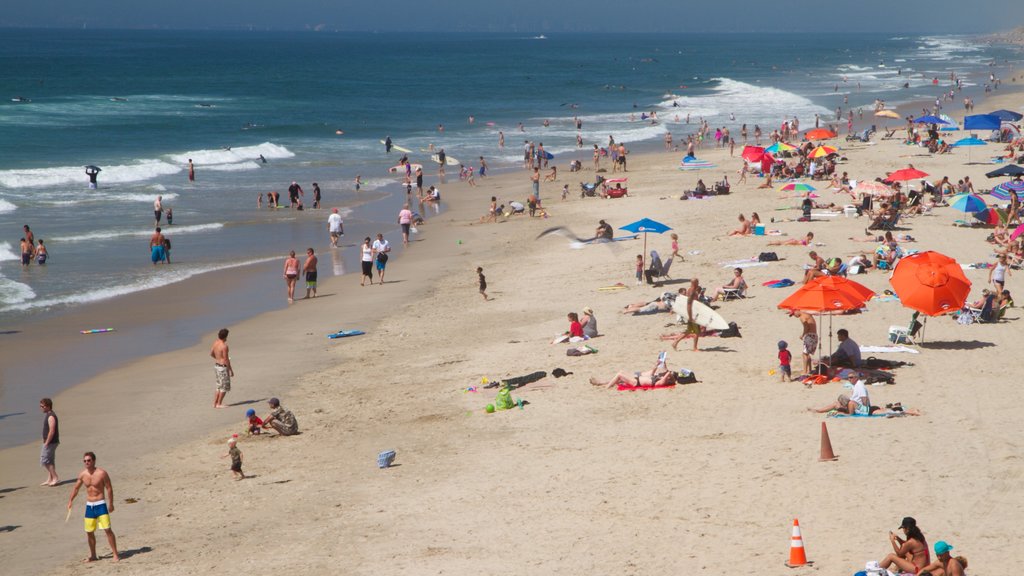 Huntington Beach showing a beach, landscape views and swimming