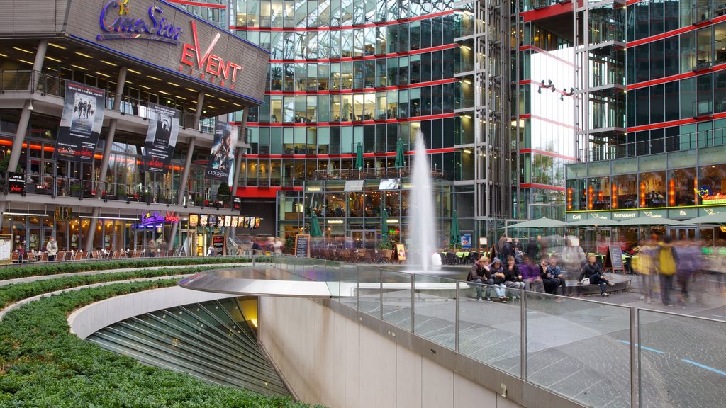 Berlin featuring a city, a fountain and a square or plaza