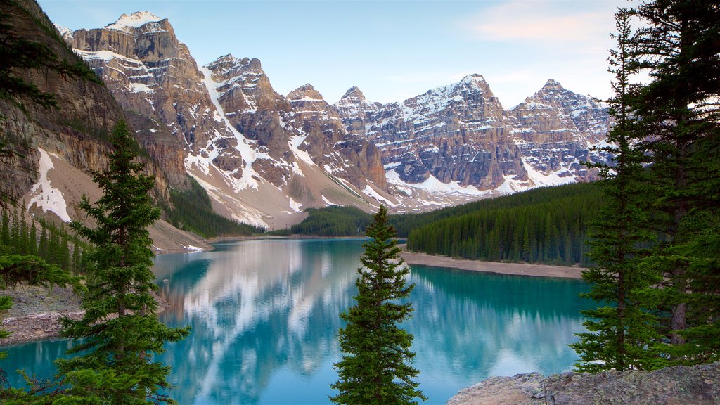 Lake Minnewanka showing a lake or waterhole and tranquil scenes