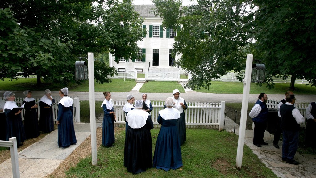 Shaker Village of Pleasant Village featuring heritage elements as well as a small group of people