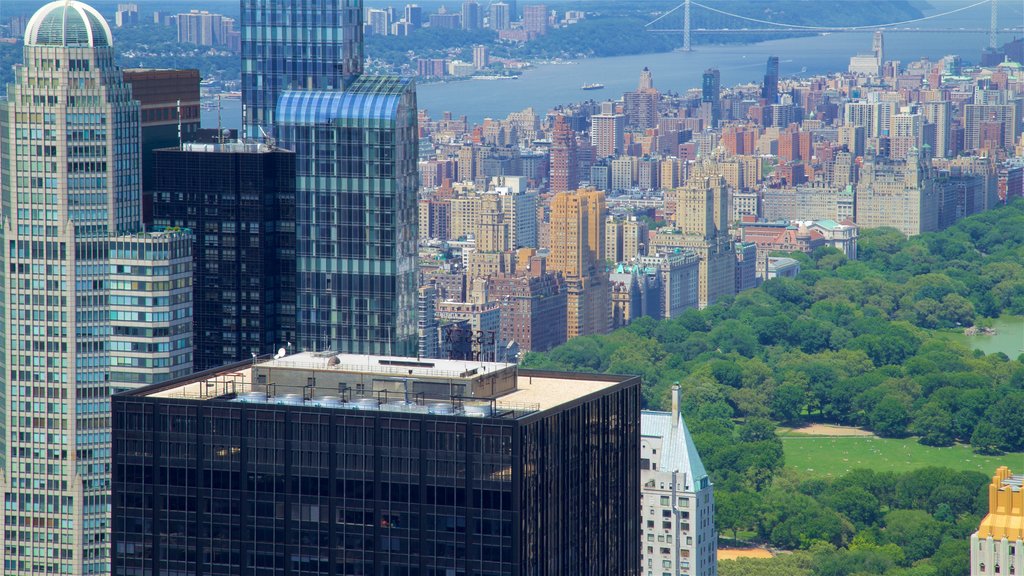 Top of the Rock Observation Deck which includes a river or creek, a high rise building and a city