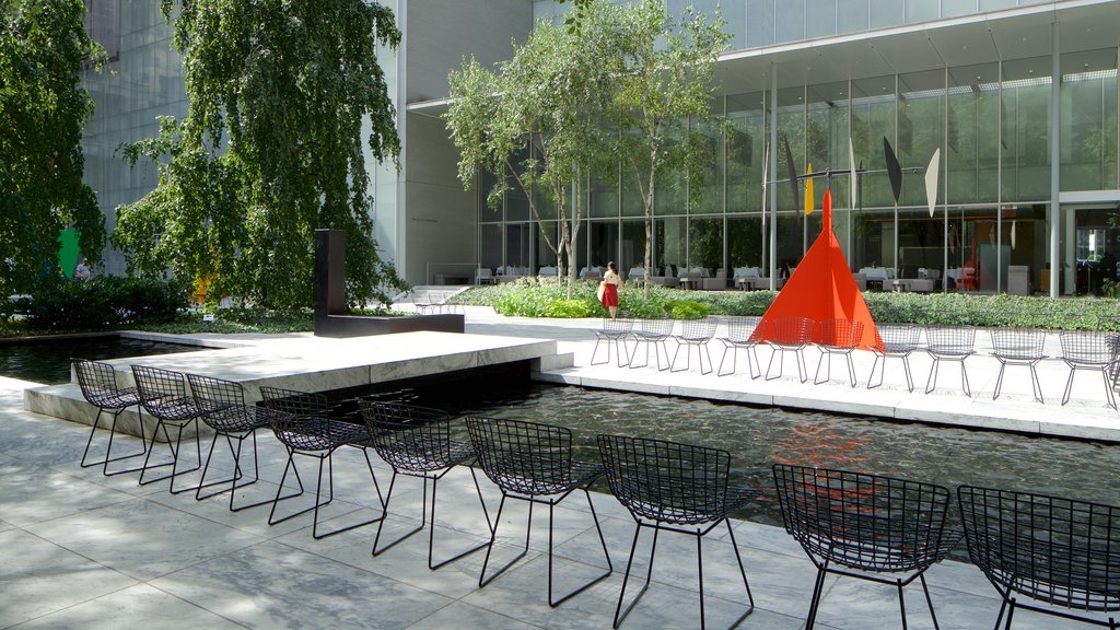 Museum of Modern Art featuring a garden and outdoor art