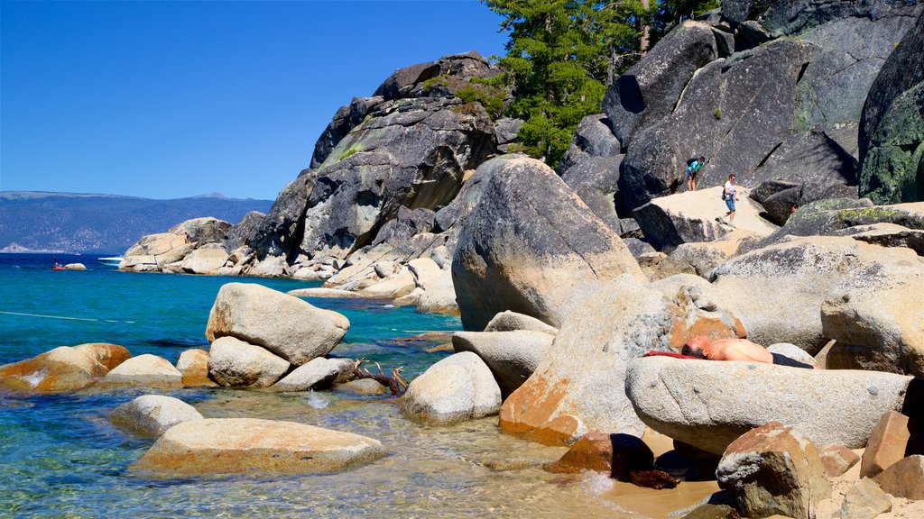 D. L. Bliss State Park showing rocky coastline and a lake or waterhole as well as an individual male