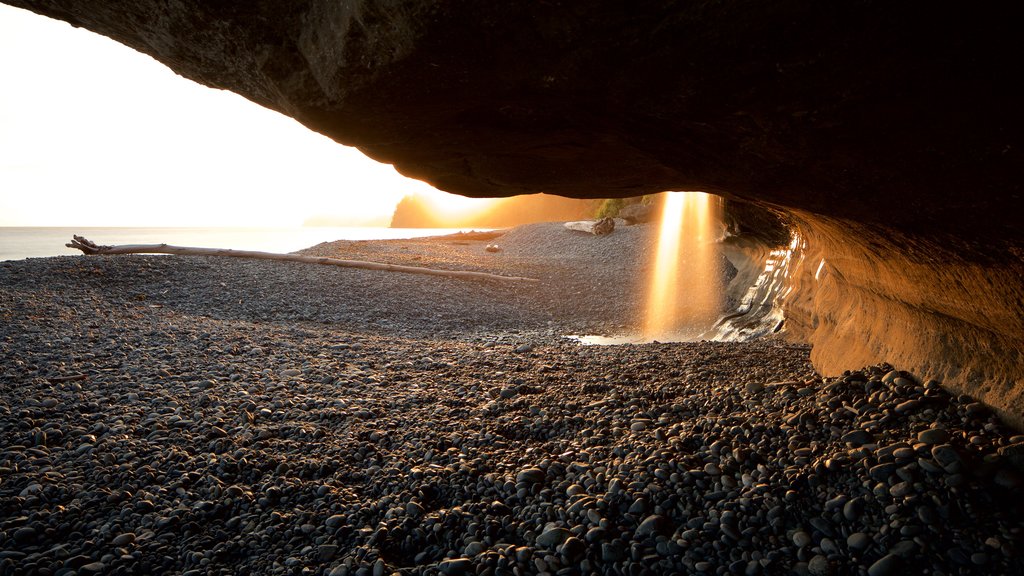 Sooke featuring a pebble beach and a sunset