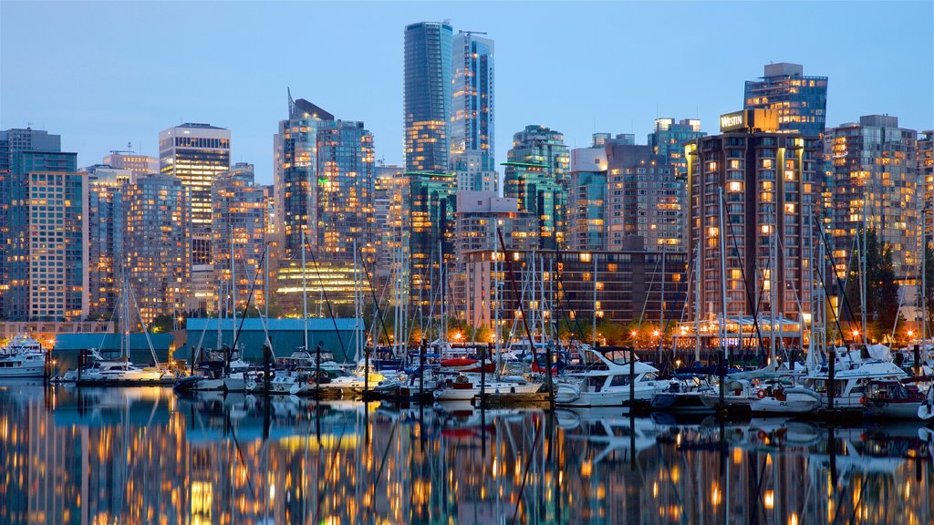 Stanley Park showing a city, a high-rise building and a bay or harbour