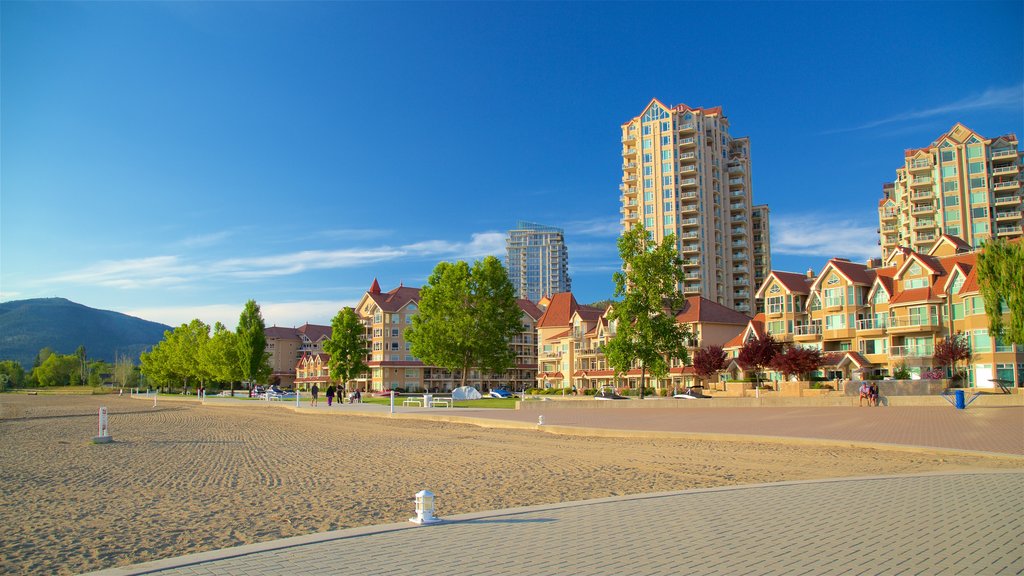 Waterfront Park which includes a sandy beach and a square or plaza