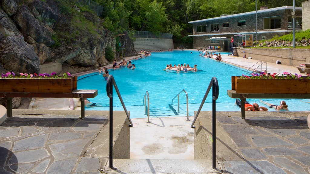 Kootenay National Park which includes a pool and swimming as well as a small group of people