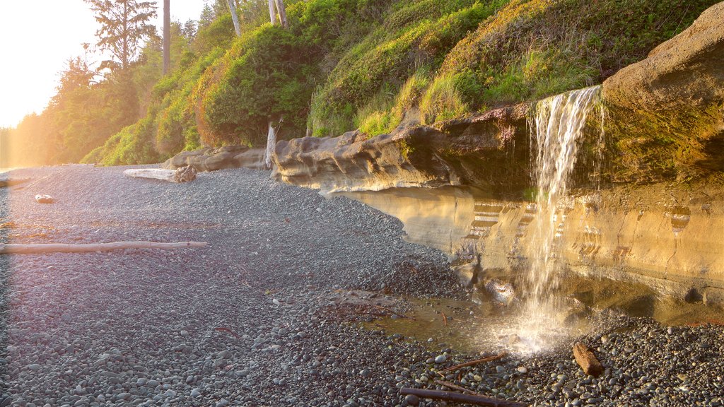 Sooke featuring a sunset and a pebble beach