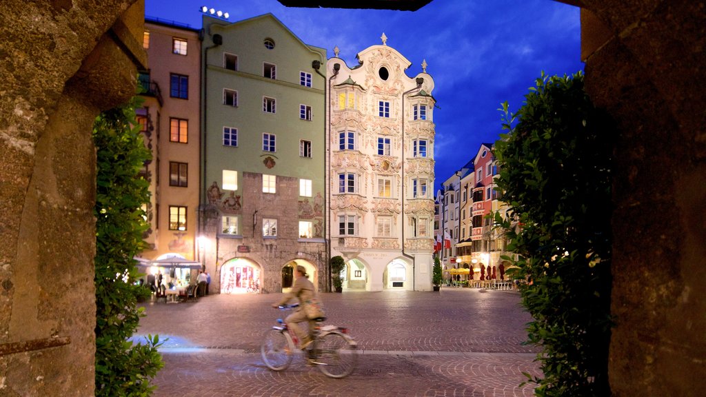 Old Town showing night scenes, road cycling and heritage elements