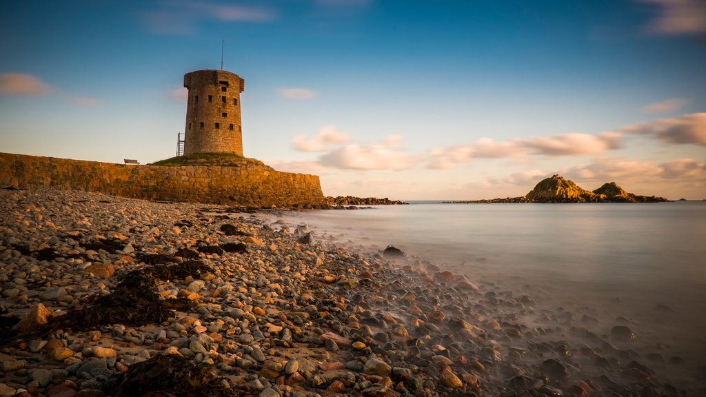 St Clement featuring heritage elements and a pebble beach